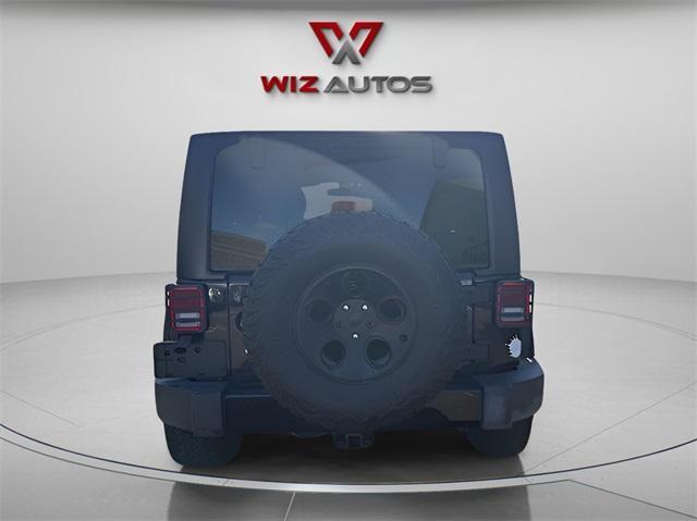 used 2014 Jeep Wrangler Unlimited car, priced at $15,331