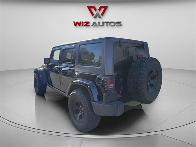 used 2014 Jeep Wrangler Unlimited car, priced at $14,494