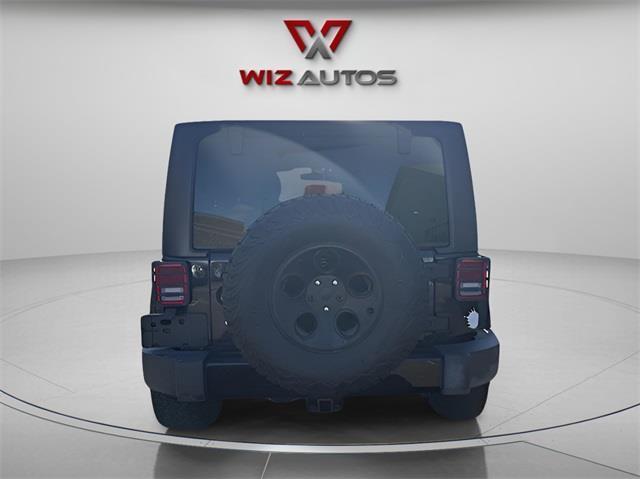 used 2014 Jeep Wrangler Unlimited car, priced at $14,494