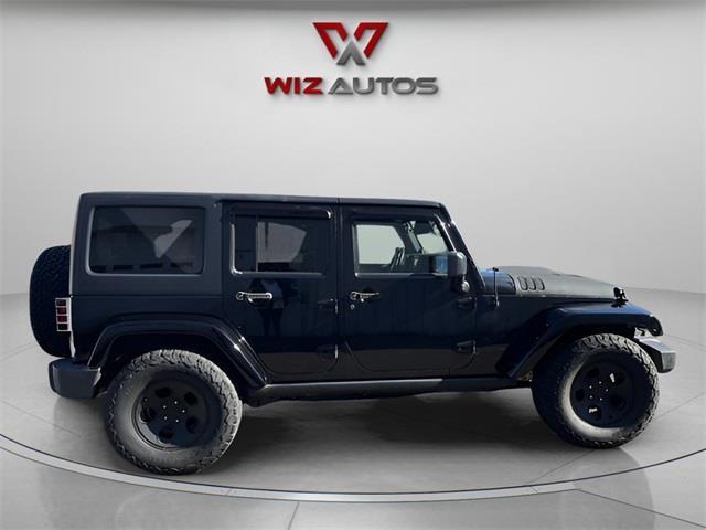used 2014 Jeep Wrangler Unlimited car, priced at $14,494