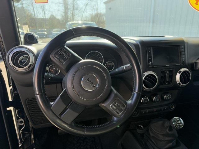 used 2014 Jeep Wrangler Unlimited car, priced at $16,421