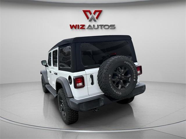 used 2021 Jeep Wrangler Unlimited car, priced at $28,833
