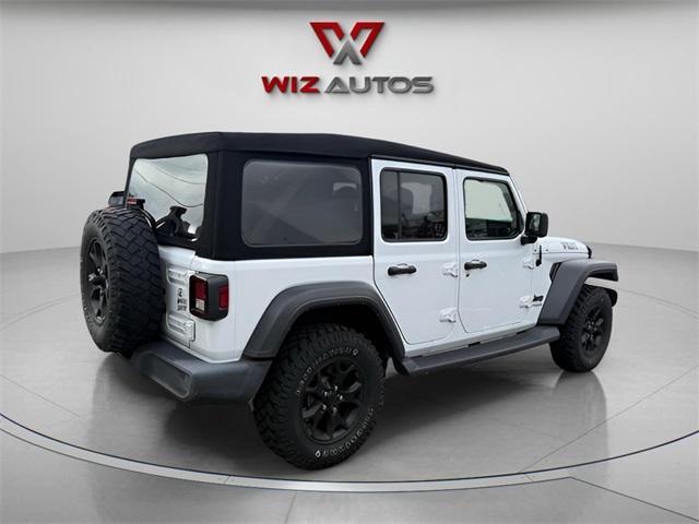 used 2021 Jeep Wrangler Unlimited car, priced at $28,833