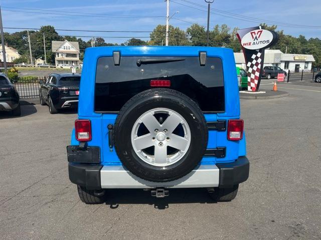 used 2011 Jeep Wrangler Unlimited car, priced at $13,946