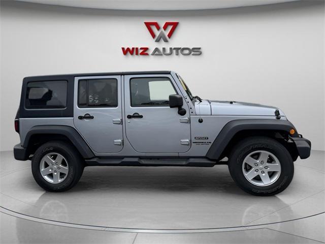 used 2015 Jeep Wrangler Unlimited car, priced at $22,691