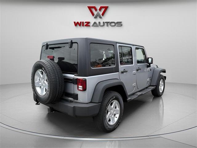 used 2015 Jeep Wrangler Unlimited car, priced at $22,691