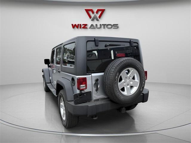 used 2015 Jeep Wrangler Unlimited car, priced at $22,691