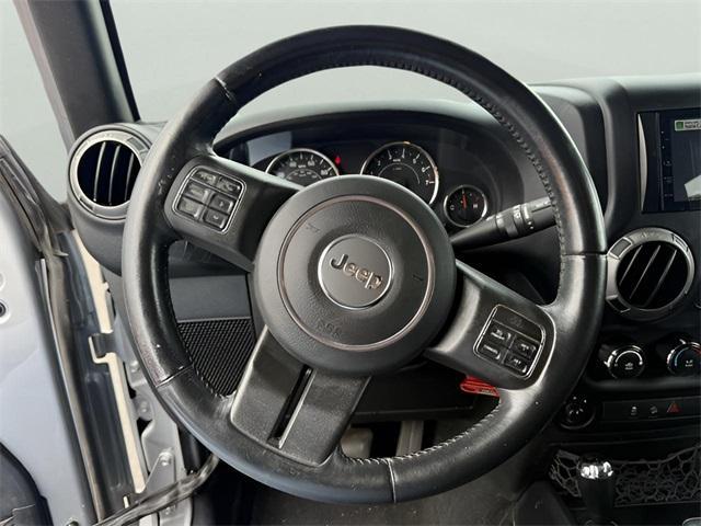 used 2015 Jeep Wrangler Unlimited car, priced at $22,691