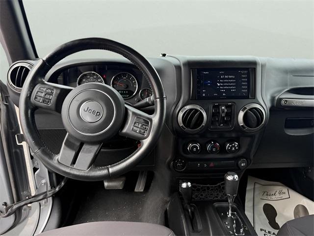 used 2015 Jeep Wrangler Unlimited car, priced at $22,691