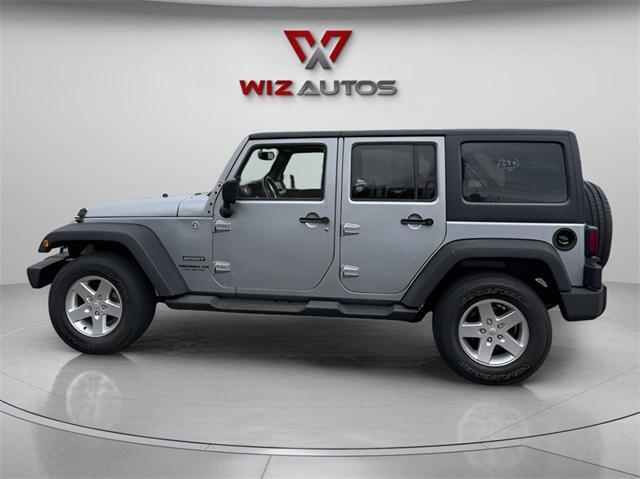 used 2015 Jeep Wrangler Unlimited car, priced at $22,691