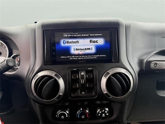 used 2015 Jeep Wrangler Unlimited car, priced at $22,691