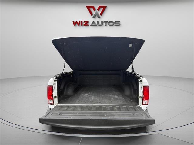 used 2015 Ram 1500 car, priced at $19,344