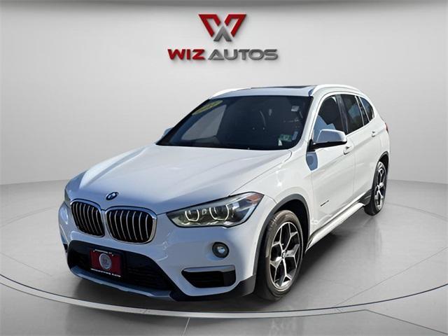 used 2017 BMW X1 car, priced at $15,997