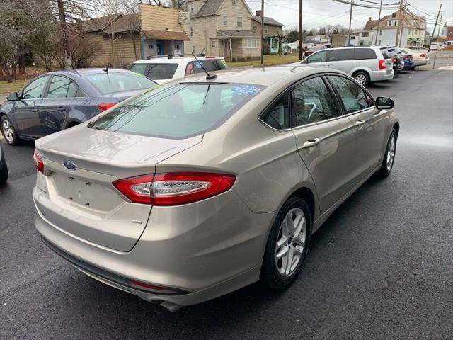 used 2016 Ford Fusion car, priced at $7,995