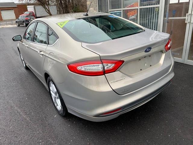 used 2016 Ford Fusion car, priced at $7,995