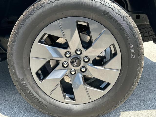 used 2023 Ford F-150 Lightning car, priced at $49,859