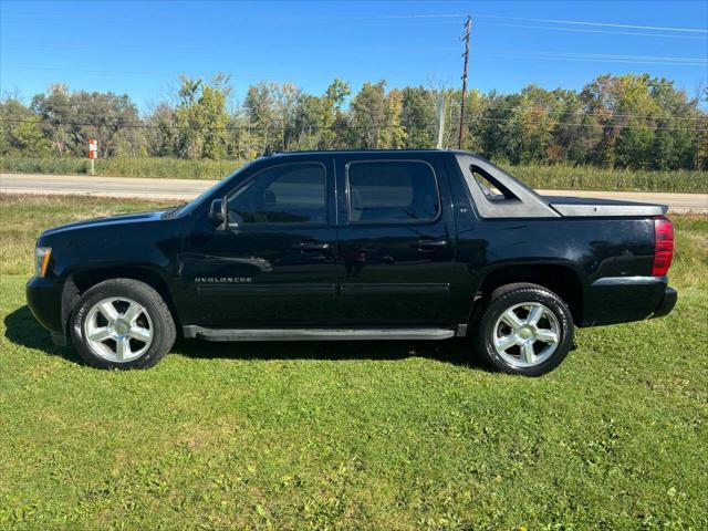 used 2010 Chevrolet Avalanche car, priced at $13,000