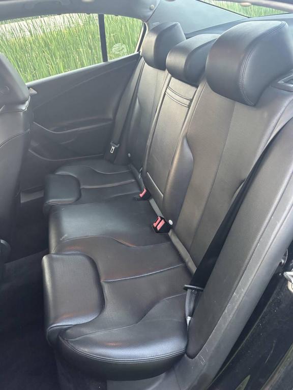 used 2010 Volkswagen Passat car, priced at $5,000