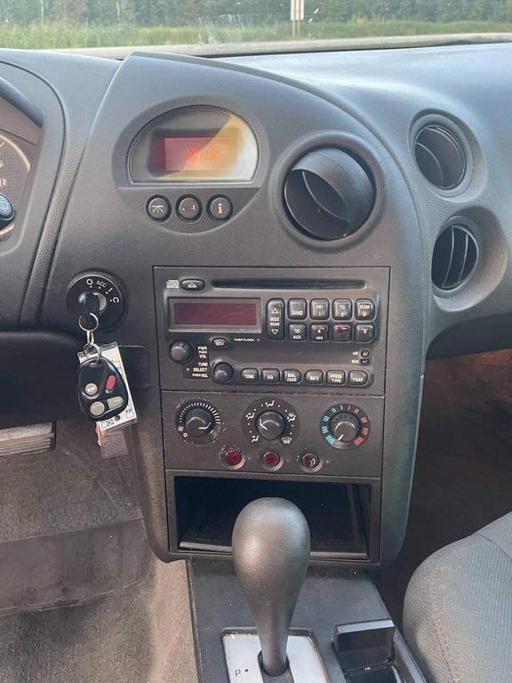 used 2004 Pontiac Grand Prix car, priced at $5,000