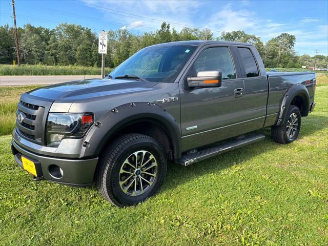 used 2013 Ford F-150 car, priced at $15,000