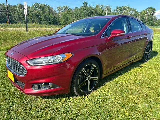 used 2014 Ford Fusion car, priced at $7,000