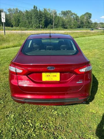 used 2014 Ford Fusion car, priced at $7,000