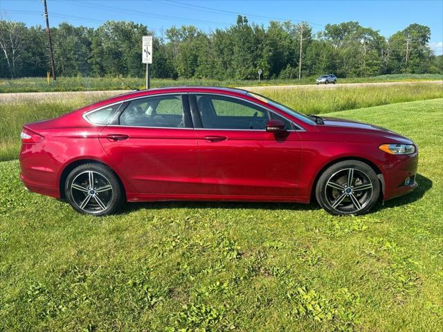 used 2014 Ford Fusion car, priced at $7,000