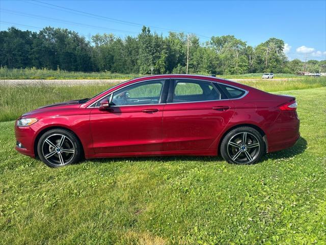 used 2014 Ford Fusion car, priced at $7,000