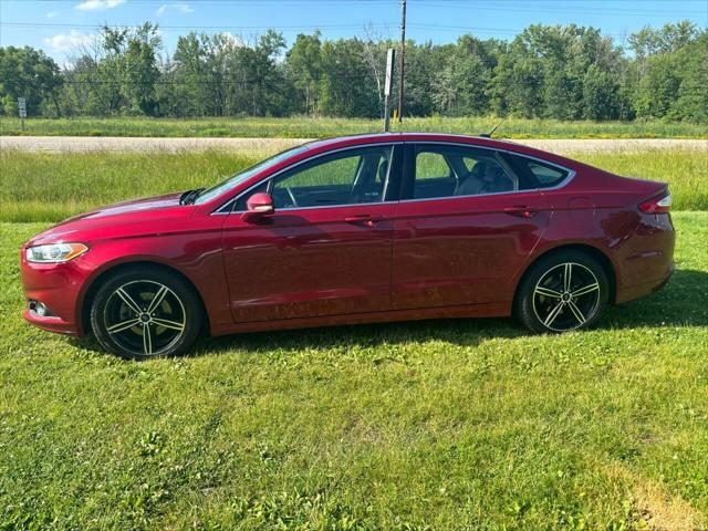 used 2014 Ford Fusion car, priced at $7,000