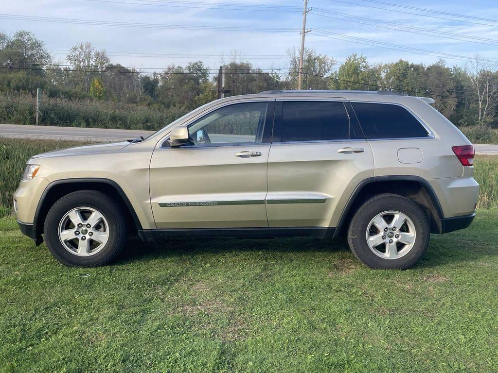 used 2011 Jeep Grand Cherokee car, priced at $7,000