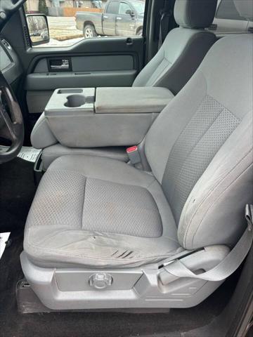 used 2014 Ford F-150 car, priced at $15,000