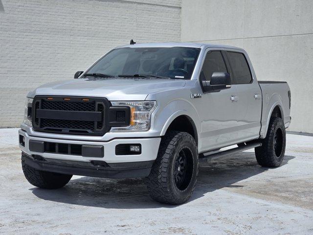 used 2019 Ford F-150 car, priced at $24,047