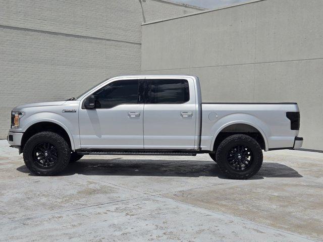 used 2019 Ford F-150 car, priced at $24,047