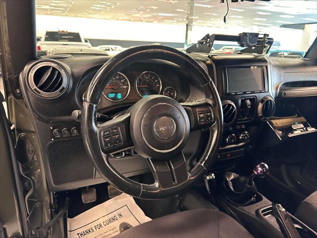 used 2015 Jeep Wrangler Unlimited car, priced at $19,995