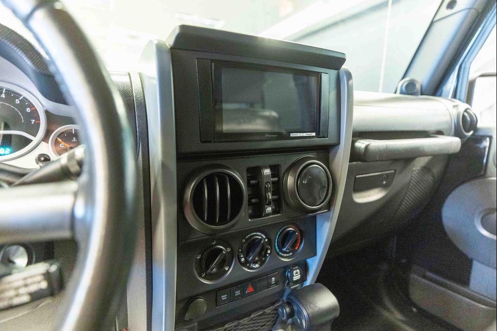 used 2010 Jeep Wrangler Unlimited car, priced at $19,999