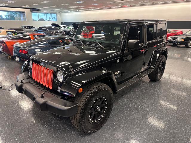 used 2014 Jeep Wrangler Unlimited car, priced at $18,998