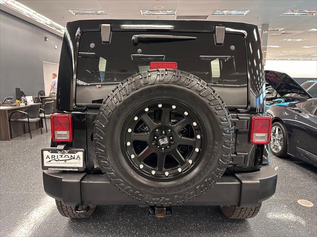 used 2014 Jeep Wrangler Unlimited car, priced at $18,998