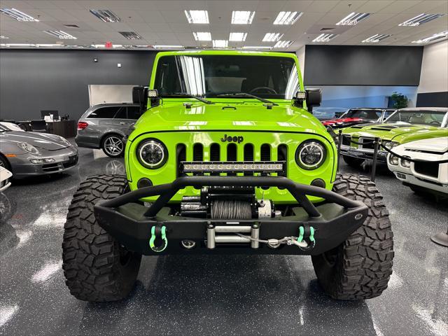 used 2012 Jeep Wrangler Unlimited car, priced at $21,498