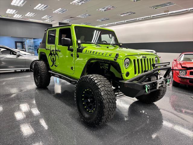 used 2012 Jeep Wrangler Unlimited car, priced at $21,998