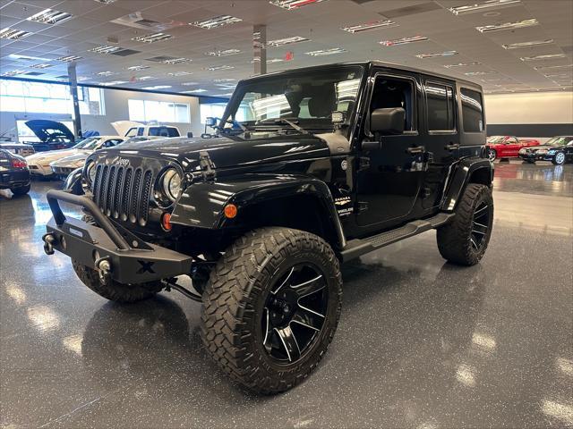 used 2013 Jeep Wrangler Unlimited car, priced at $20,498