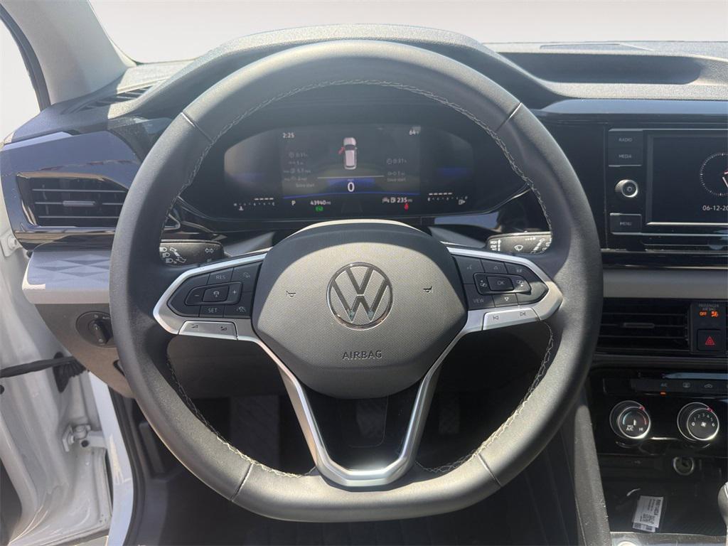 used 2024 Volkswagen Taos car, priced at $17,995