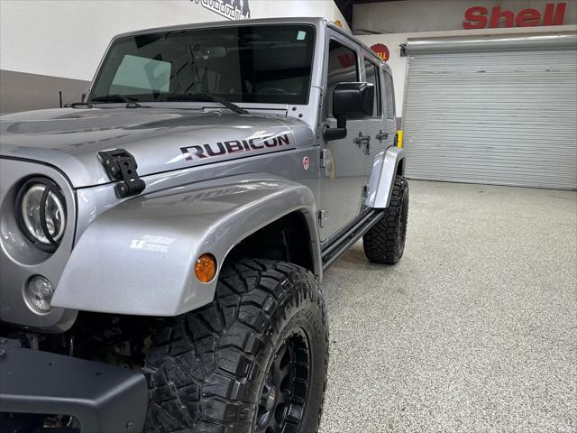 used 2016 Jeep Wrangler Unlimited car, priced at $27,995