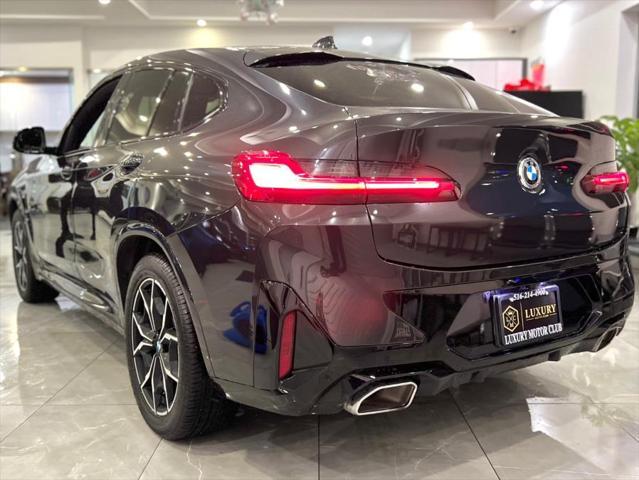 used 2023 BMW X4 car, priced at $36,850