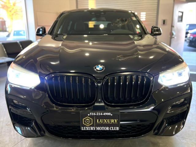 used 2021 BMW X4 car, priced at $38,850