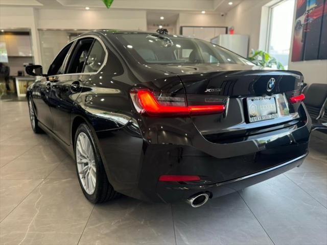 used 2024 BMW 330 car, priced at $29,850