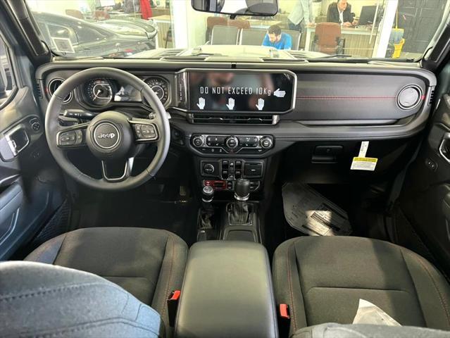 used 2025 Jeep Wrangler car, priced at $59,850