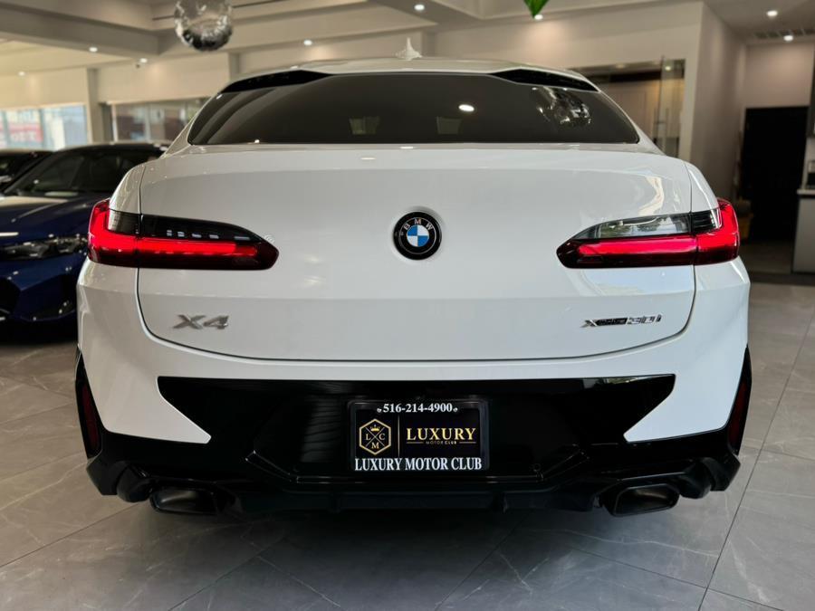 used 2025 BMW X4 car, priced at $49,850
