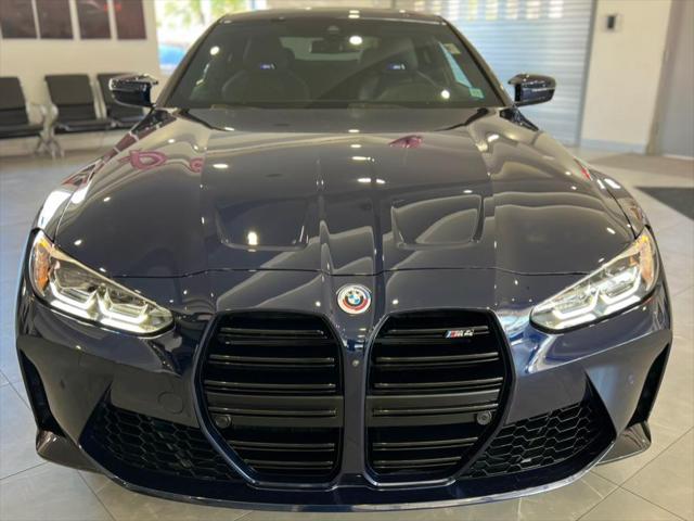 used 2023 BMW M4 car, priced at $55,850