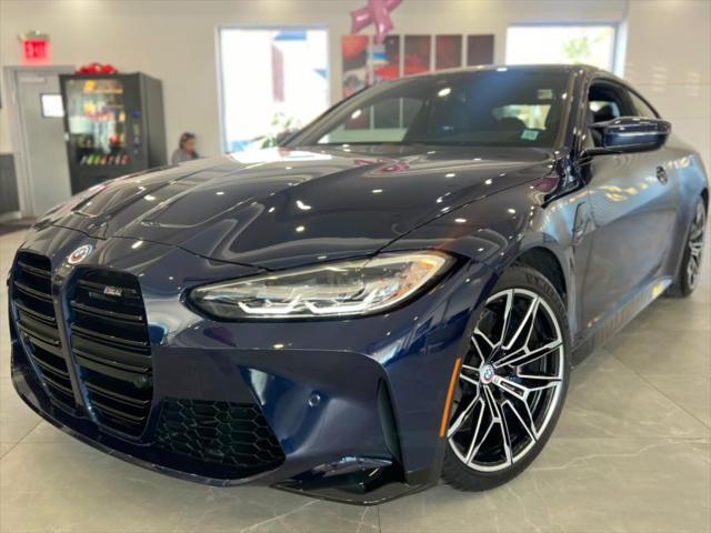 used 2023 BMW M4 car, priced at $55,850