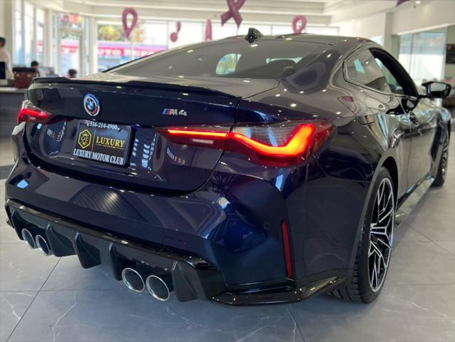 used 2023 BMW M4 car, priced at $55,850